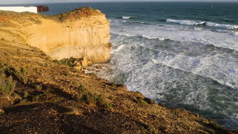 ocean waves hitting cliffs at twelve apostles