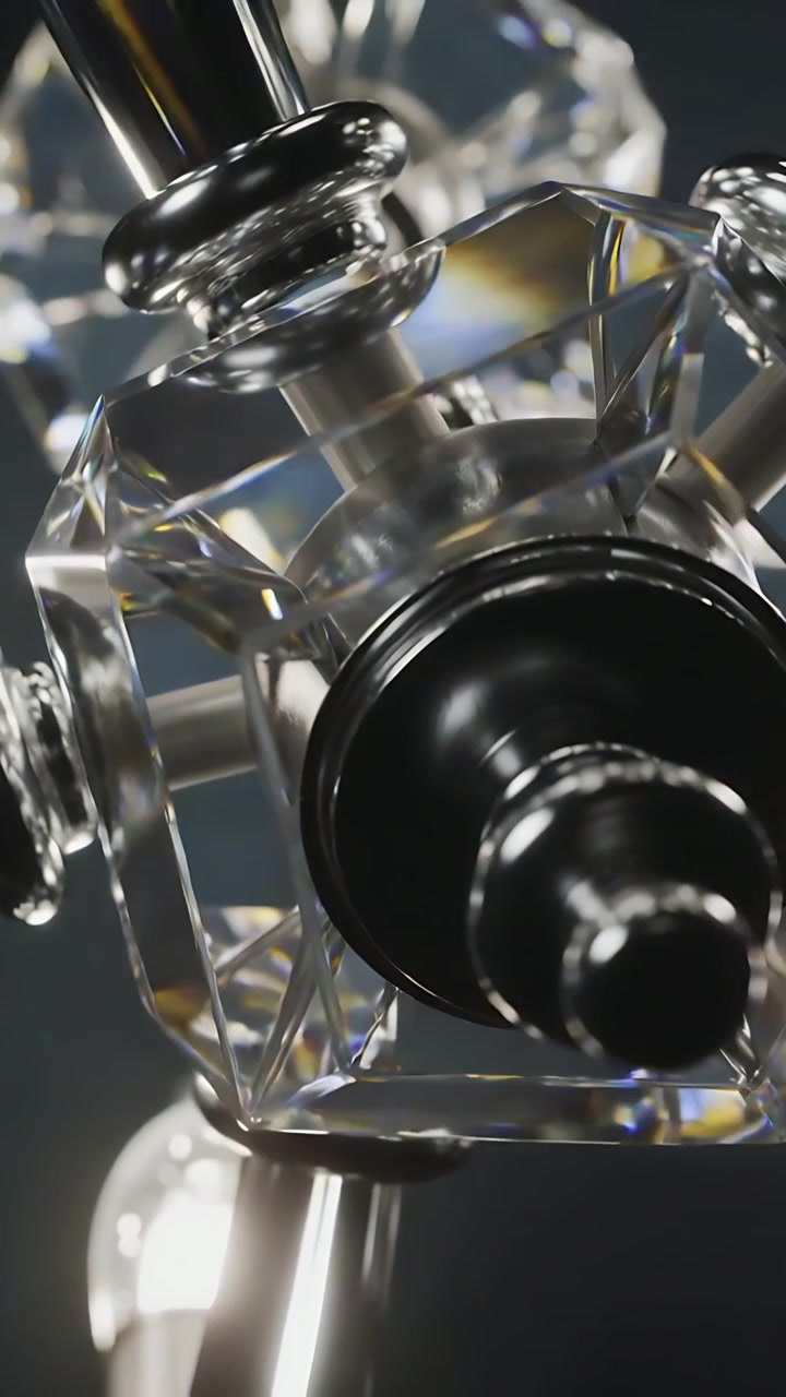 Vertical video: Camera rotating revealing prism hub, black shaft and rings in studio to show glints