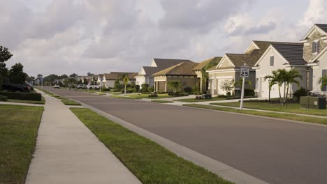 Tropical-suburban-development-street-in-a-quiet-neighborhood