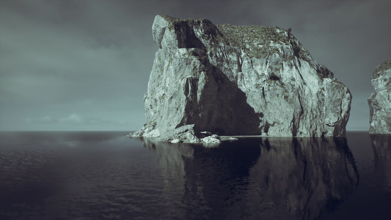 Majestic granite cliffs rise above tranquil waters in a moody landscape