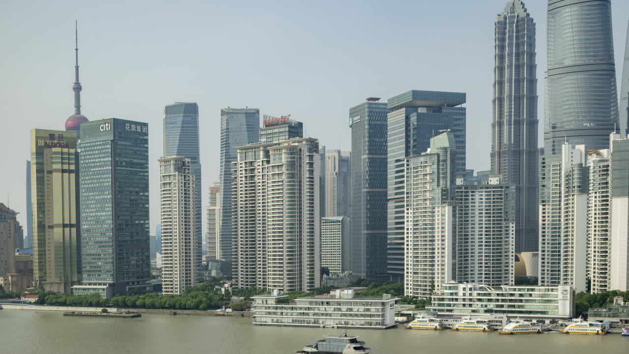 SHANGHAI, CHINA - 11 JUNE 2025 : Timelapse of the Shanghai city skyline from a high vantage point at night