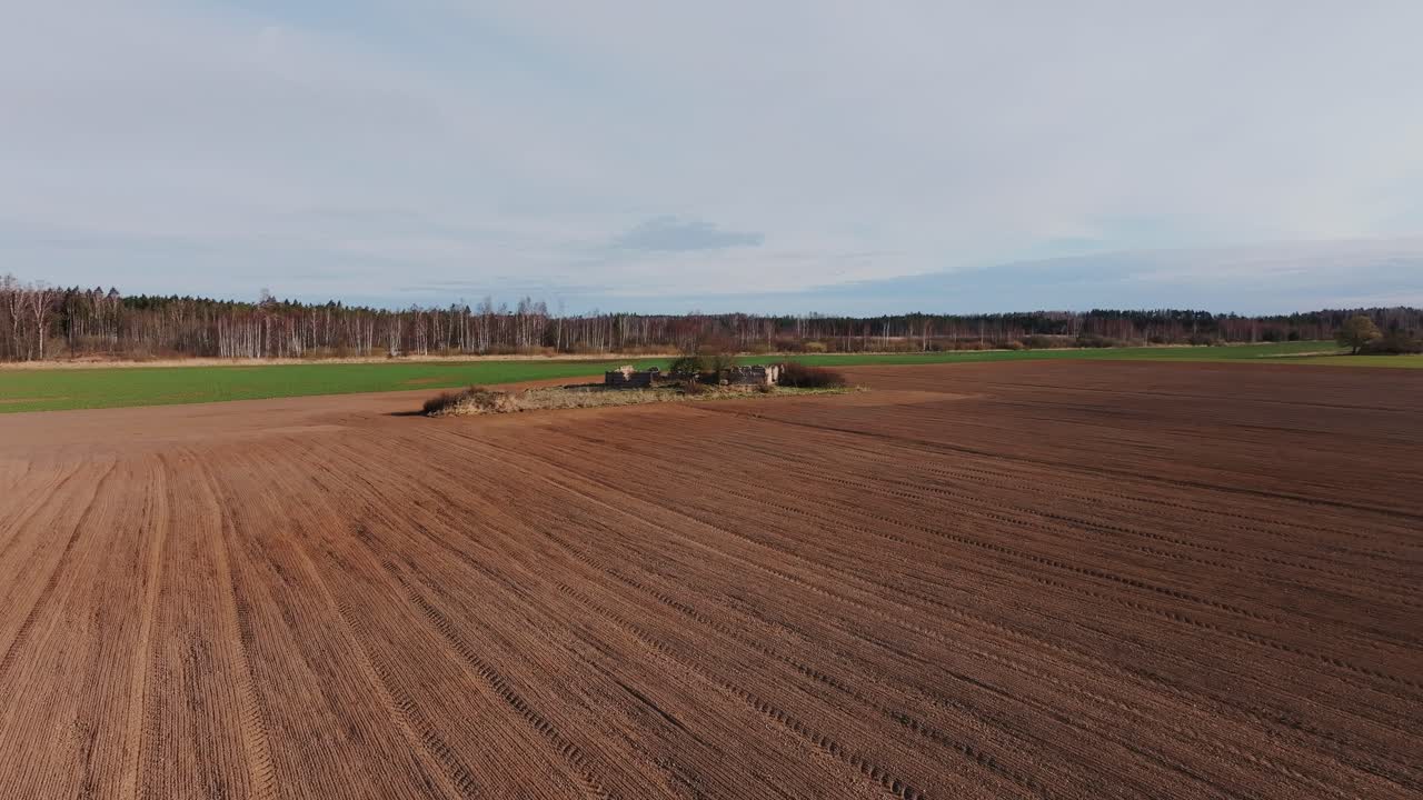 Abandoned structures limit farmland potential in scenic Latvia, early spring