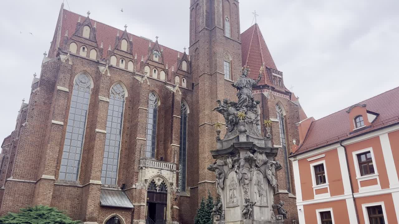 Gothic Church with Statue in Old Town
