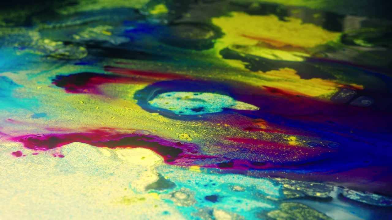 Colourful, organic, liquids macro shots buzzing and flowing