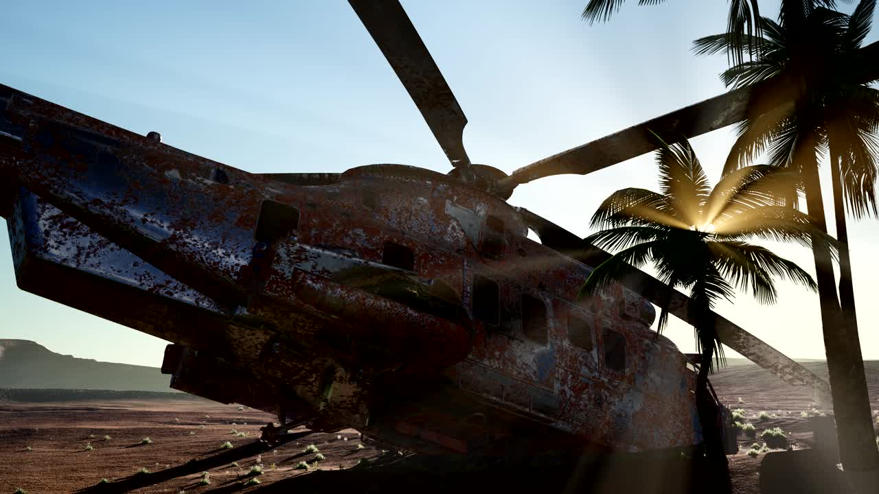 viejo helicóptero militar oxidado en el desierto al atardecer