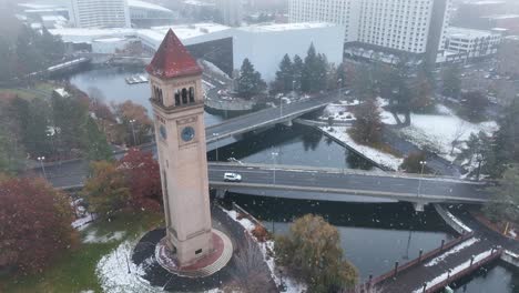 aerial view of the spokane, washington clocktower with a light dusting of snow falling