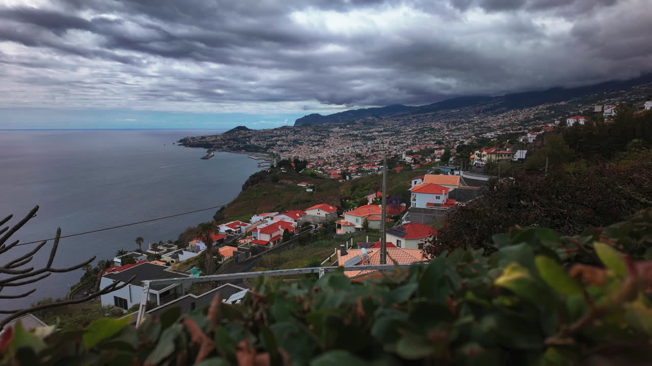 Funchal timelapse on an overcast day, tilting up, Madeira island, Portugal