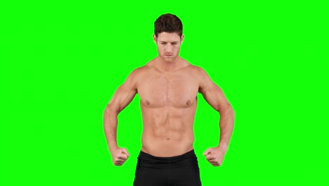muscular man flexing his muscles