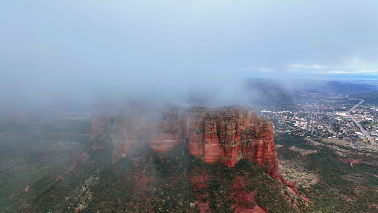 Stunning Aerial View of Sedona, Arizona Red Rocks Covered in Fog