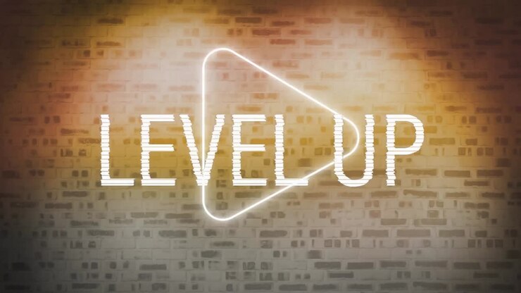 Digital animation of level up text over neon play icon against brick wall