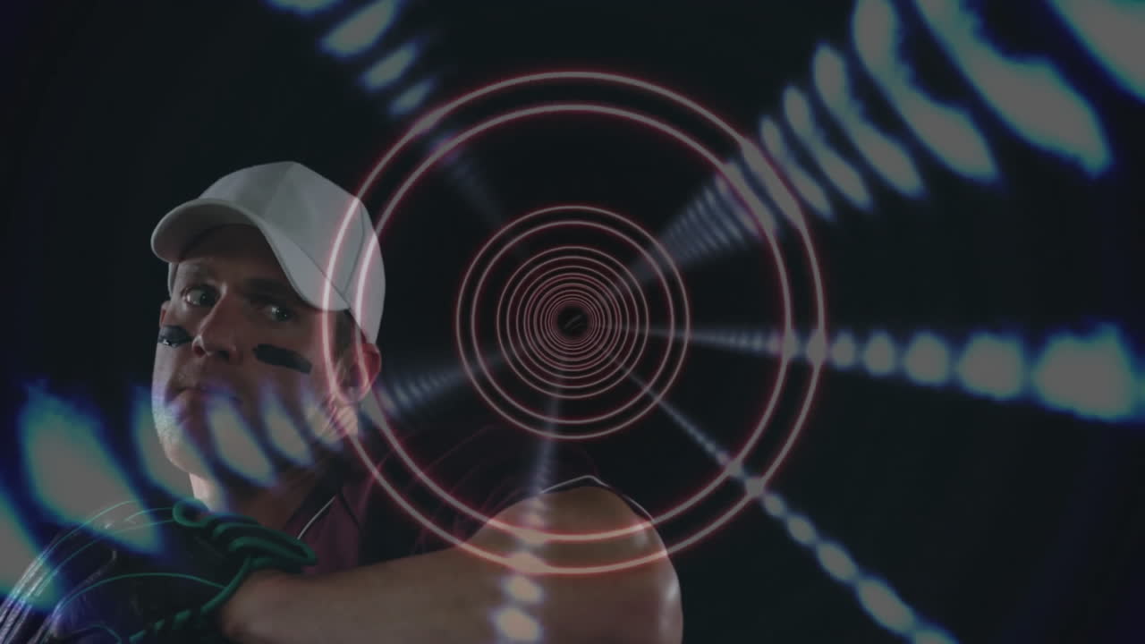 Wearing cap and face paint, athlete with animation of digital patterns behind