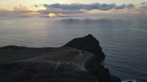 evocative sunset over sea and ilheu de ferro island, porto santo in portugal