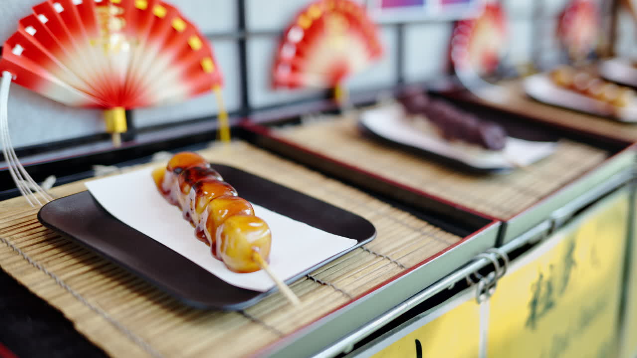 Close up of dango served on a skewer at a street food market in Japan