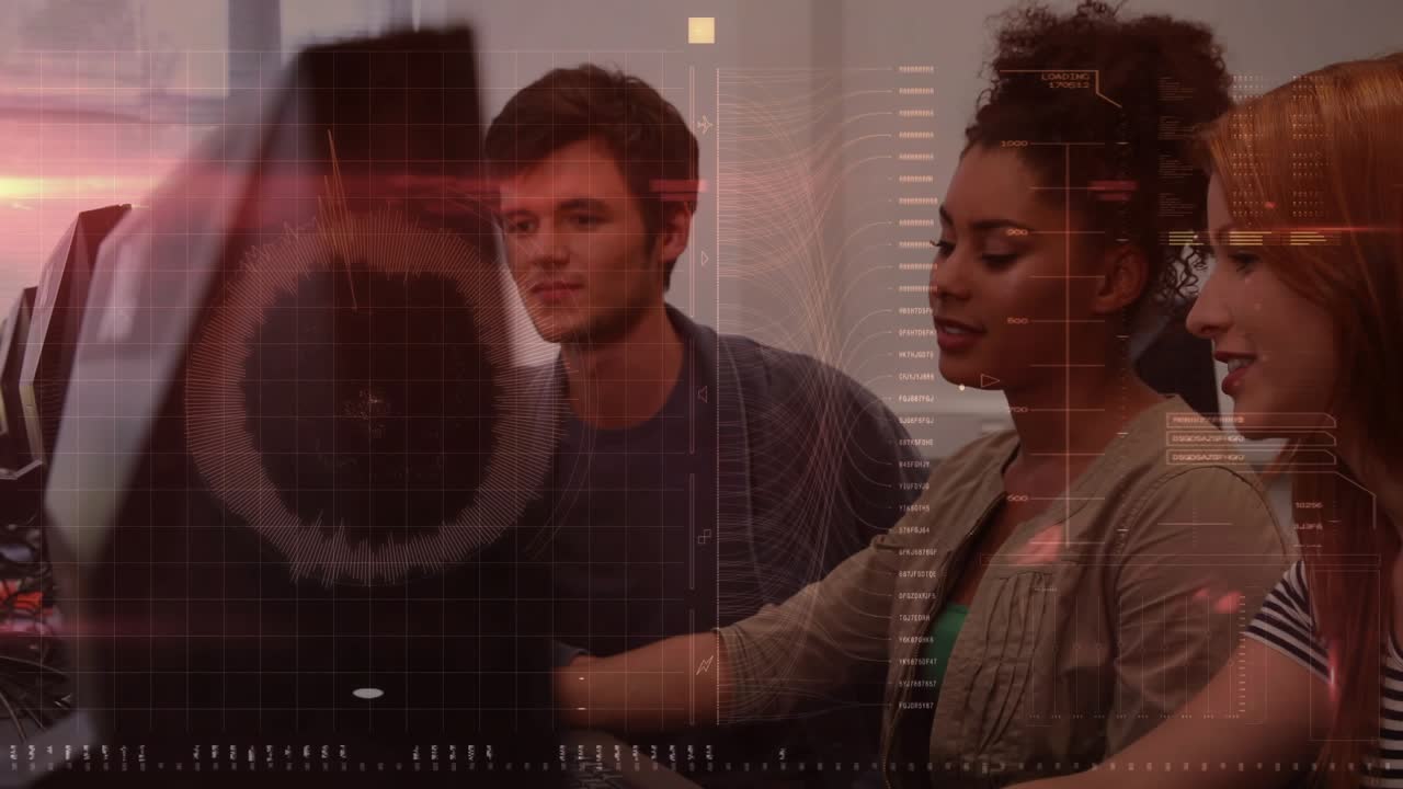 Male moving mouse guiding peers in computer lab, HUD overlay highlighting interactions for learning