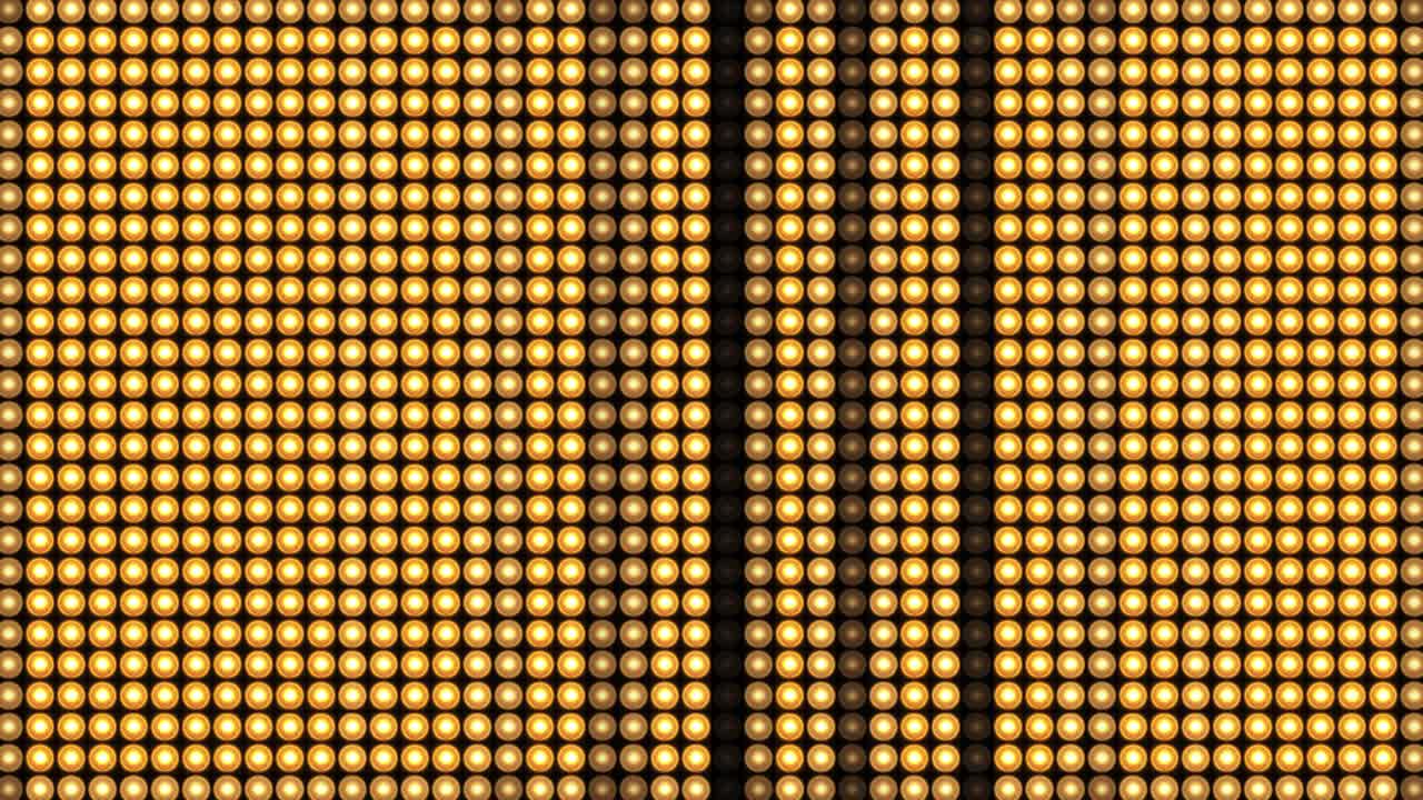 Bright spotlight golden and orange color modern lighting loop animation background flash on the wall