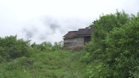 the mountains are covered with clouds