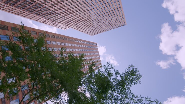 Tomada vertical de torres residenciais emergentes no Distrito Comercial de Zuidas em Amsterdã, Países Baixos.
