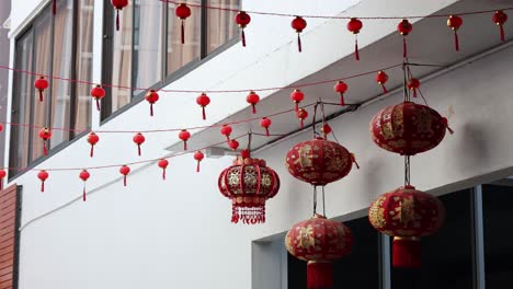 decorative lanterns hanging in a festive outdoor setting