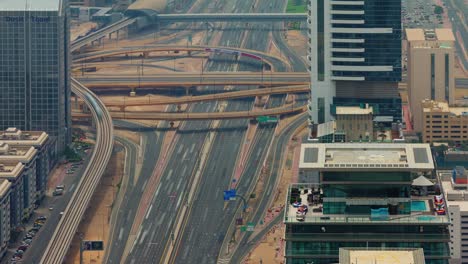 dubai hot day traffic road junction close up roof top view 4k time lapse united arab emirates