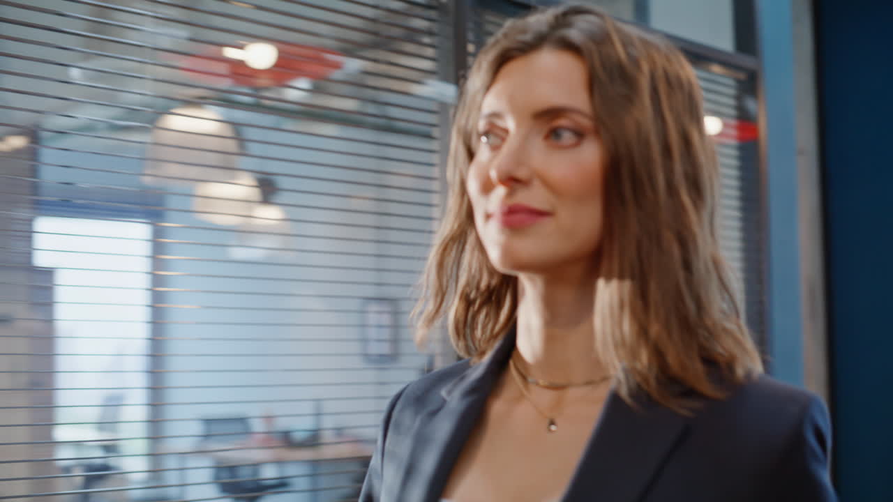 Wealthy lady walking corporate building corridor closeup. Successful woman
