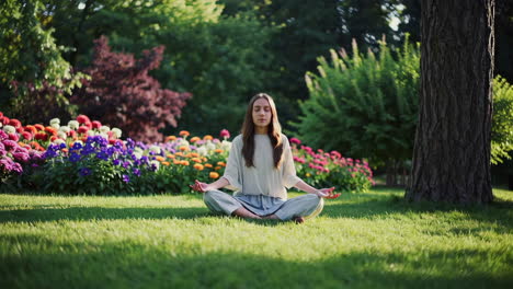 woman meditating in a park