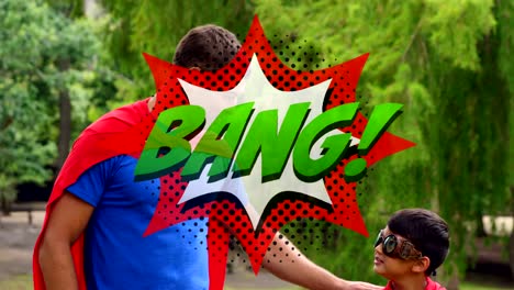 bang text on speech bubble against dad and son in superhero costume