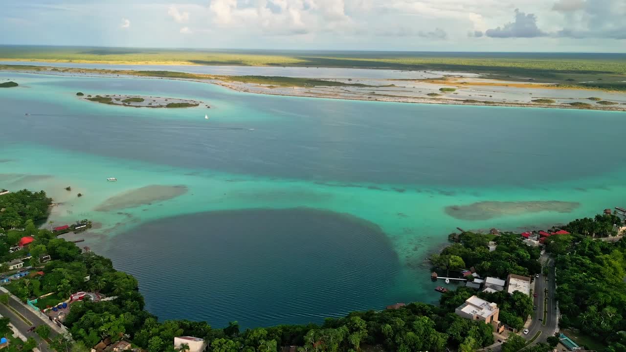Coastal Road And City Of Bacalar, Magic Town In Quintana Roo, Mexico. Aerial Drone Shot