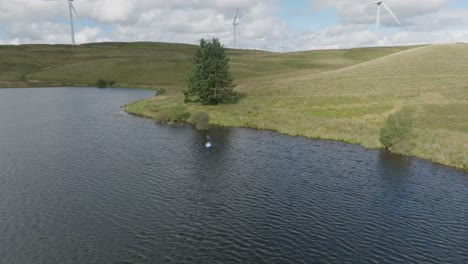 Close-Aerial-Circling-Shot-Of-A-Young-Woman-Paddling-On-A-Stand-Up-Paddleboard