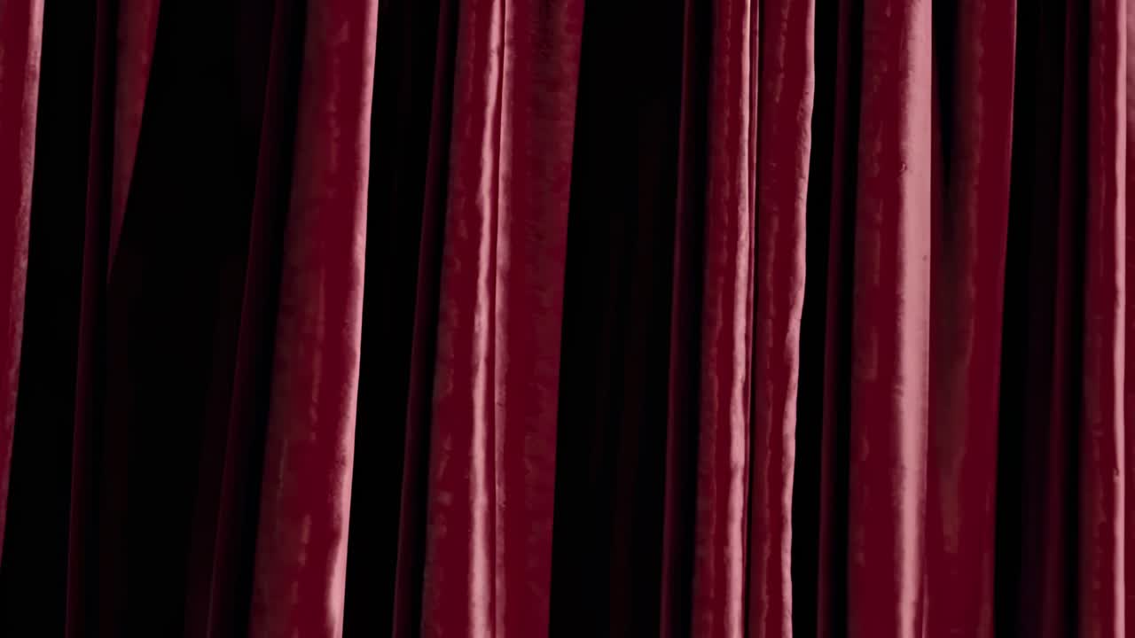 Luxurious red velvet curtains swaying gently, revealing layers of mystery and elegance within shadowy theatrical space, creating mesmerizing dramatic atmosphere