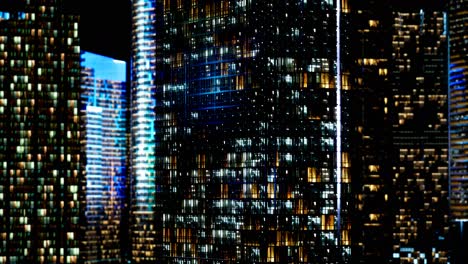 Skyscrapper-in-the-business-quarter-in-the-night