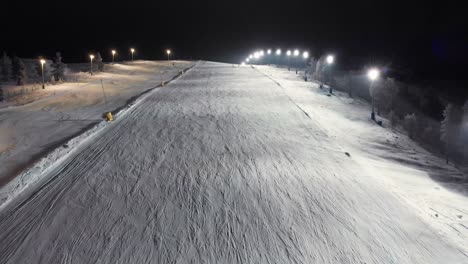 aerial of ski slope "västbacken" in idre fjäll, sweden during a late evening after sunset