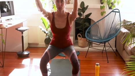 caucasian woman doing sport at home