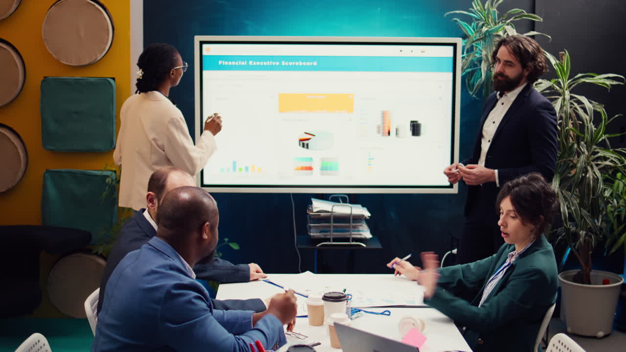 Tensed business team studying statistics to find issues within project structure