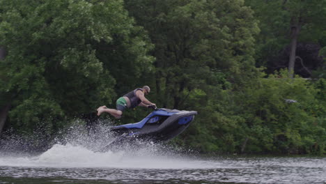 stylish extreme sport jet ski tricks jumping on fresh water in canada