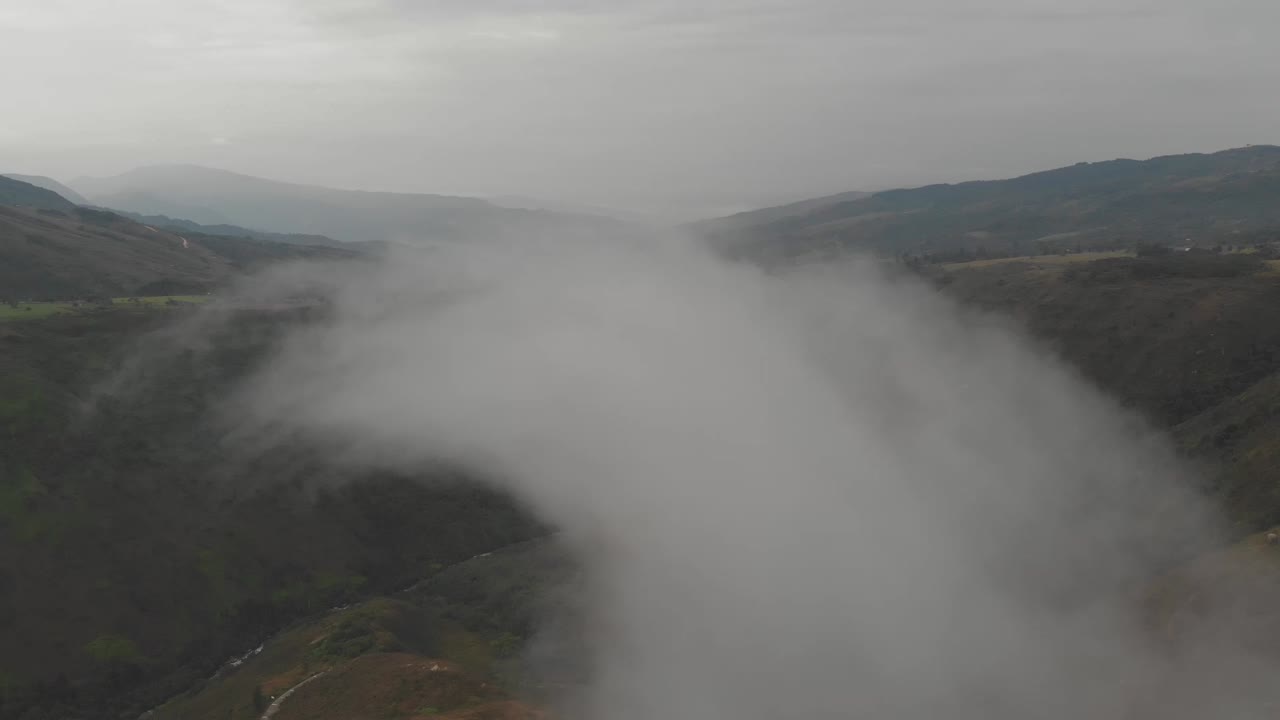 Cloudy sky between montains in Colombia