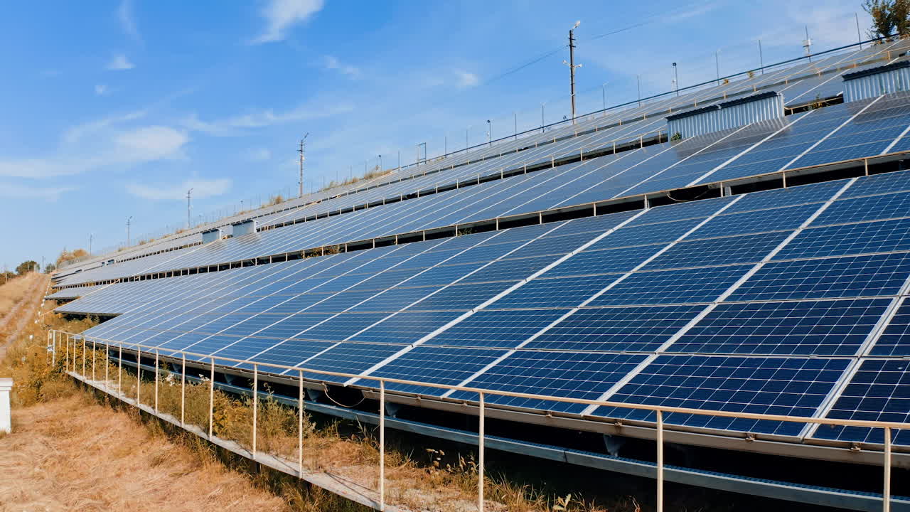 Photovoltaic panels under blue sky. Modern sunny batteries get clean alternative energy from the sun. Renewable source of energy.