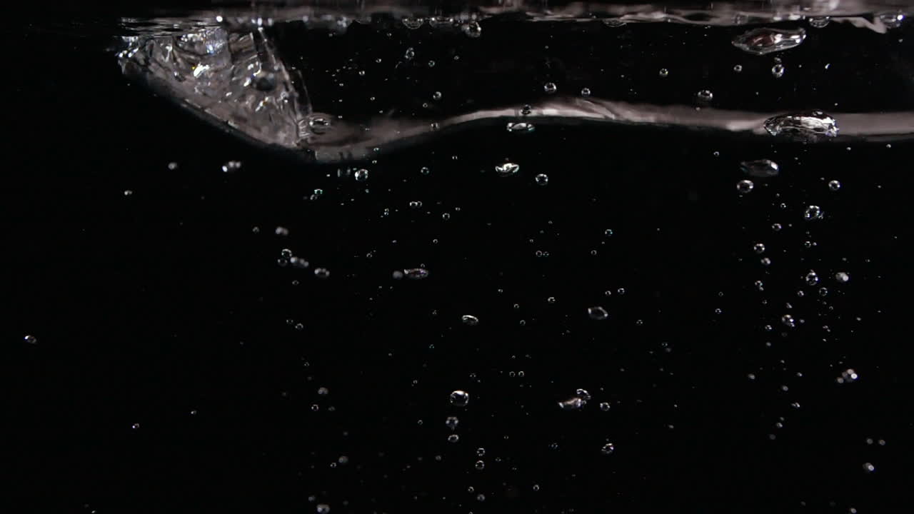 Slow Motion Cutlery and Kid Spoon Falling in Kitchen Sink