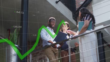 animation of graph with changing numbers over diverse coworkers discussing in balcony of office