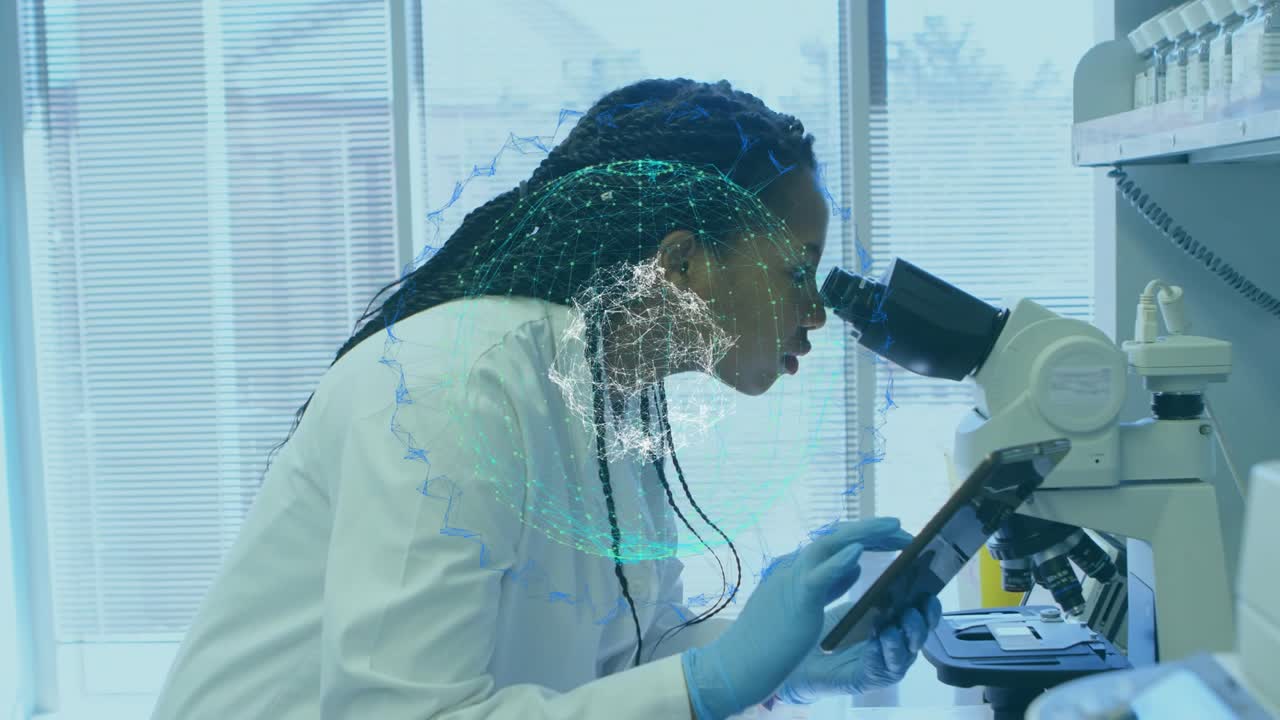 Woman researcher tapping tablet and peering into eyepiece, analyzing sample with DNA overlay moving