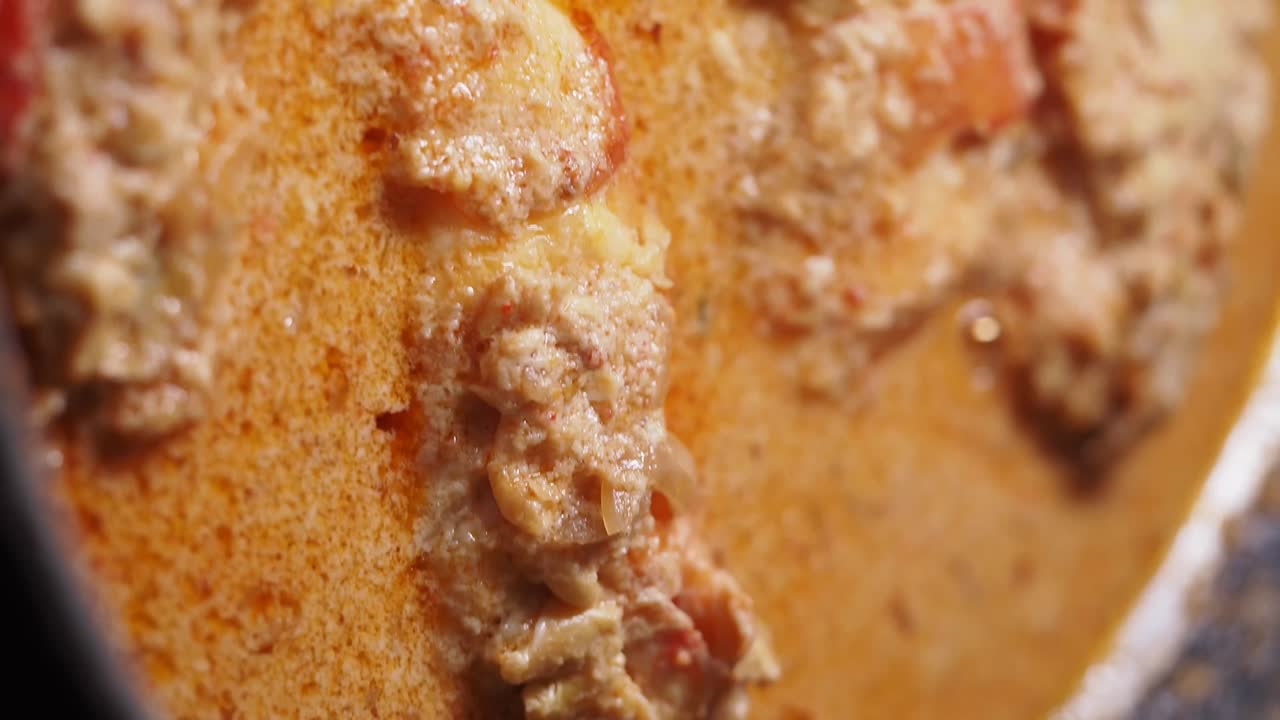 Close-up of a flavorful dish with a rich sauce