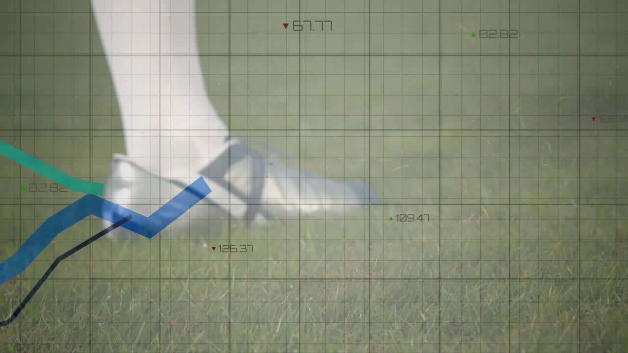 Graph animation over close-up of person wearing cleats on grassy field