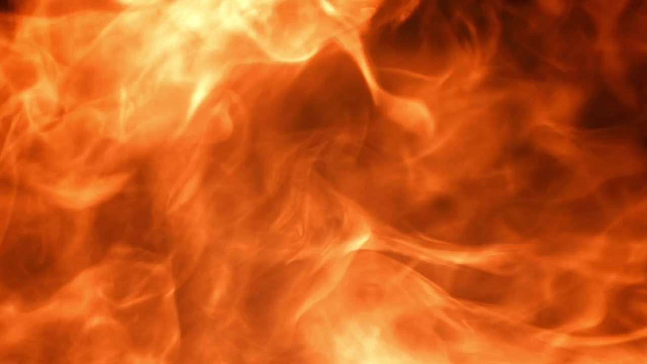 Dynamic Red and Orange Smoke Swirling on Black Background