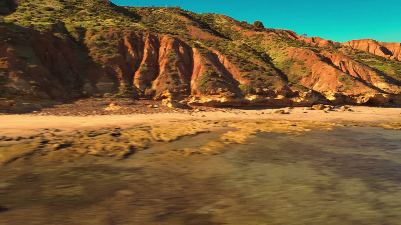 Aerial view of seascape along the vast beach on the South Coast during summer