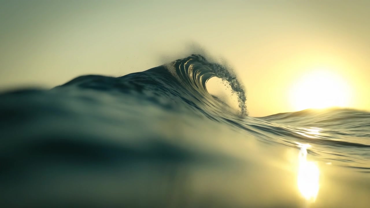Powerful Ocean Wave Curling Against a Golden Sunset Sky