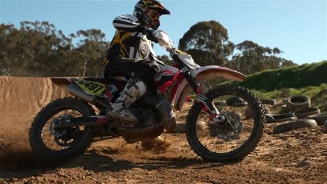 man riding a motor cross bike