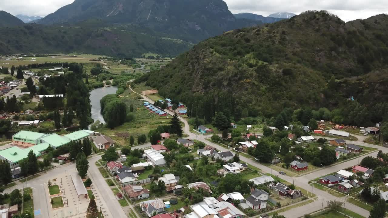 Villa Maniguales, Small City in Aysen Region, Chile. Aerial View of Settlement Under Andes Mountains