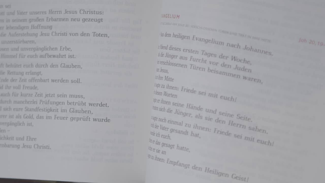 Close-up of a german evangeliary, focus moves from one page to the other