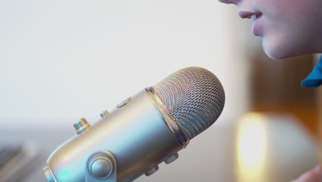 Young-man-uses-a-microphone