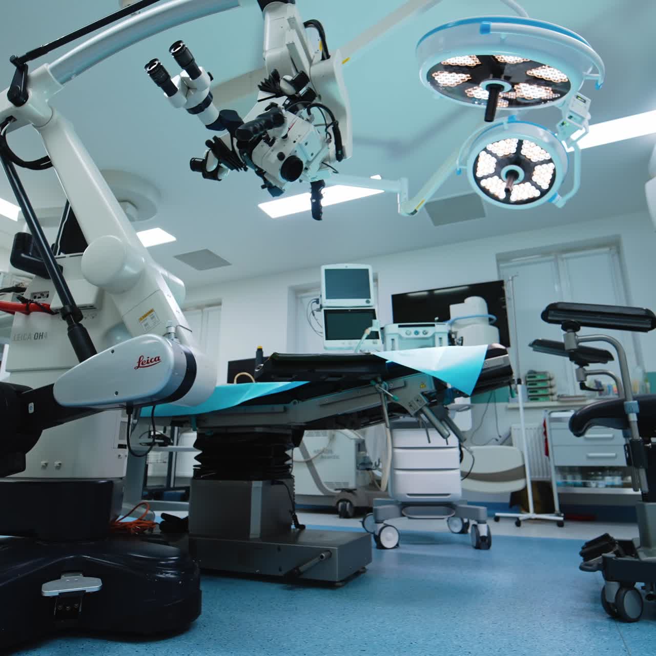 Overview of the modern advanced neurosurgical equipment in the empty room. Operational theatre from low angle view