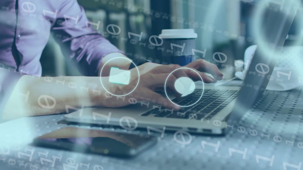 Businessman typing on laptop keyboard at cafe table, icons appearing and cycling, magnifying search